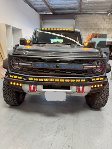 ford bronco with amber day time running lights amber, roof bar, bumper light bar, fog lights and ditch lights