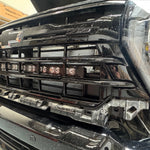 Silverado 2500 3500 light bar installed behind lower grille on 2020-2026 Chevy Silverado 2500HD 3500HD front bumper