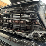 Silverado 2500 3500 light bar installed behind lower grille on 2020-2026 Chevy Silverado 2500HD 3500HD front bumper
