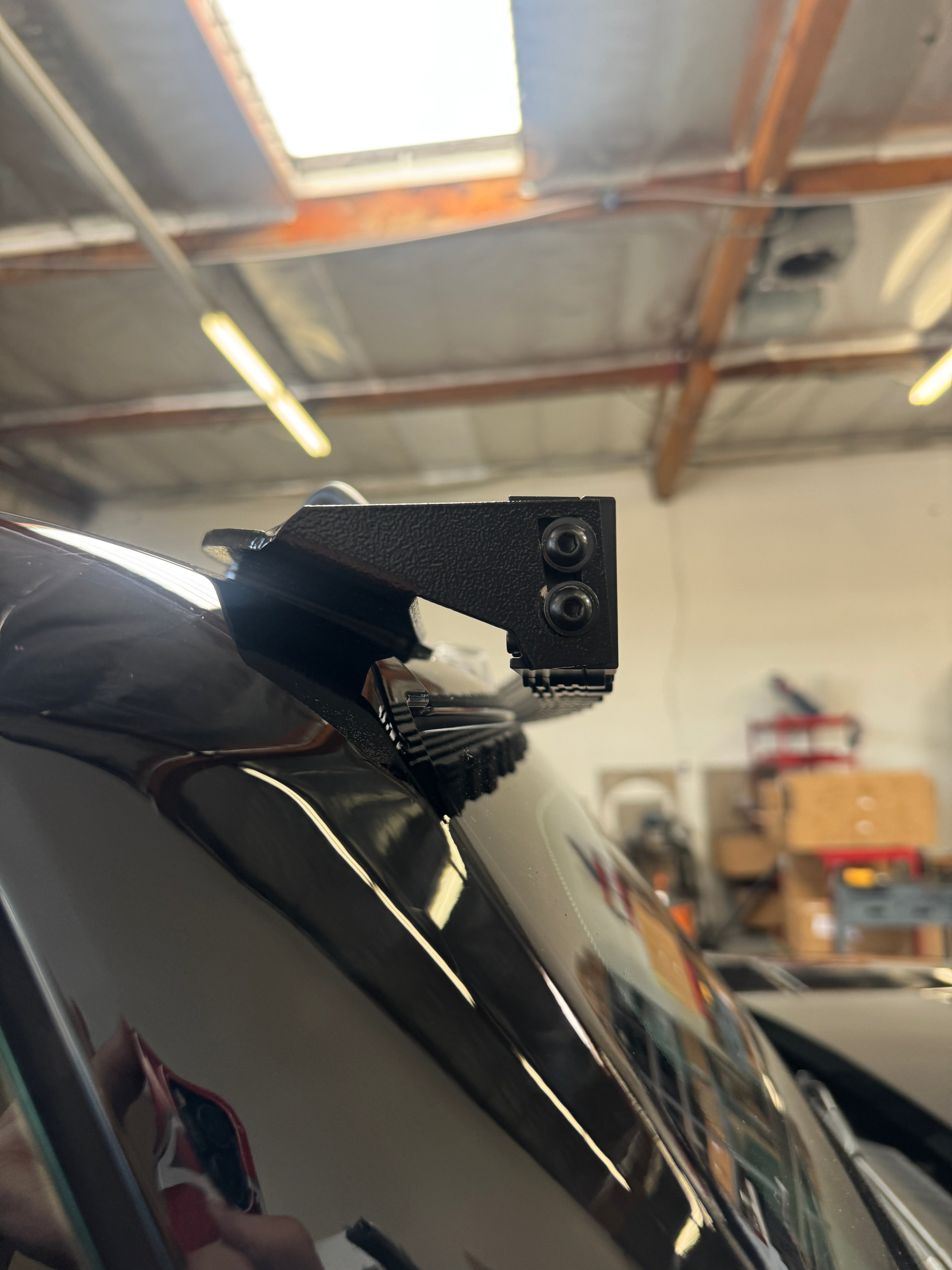 hummer ev roof light bar mounting bracket close up black