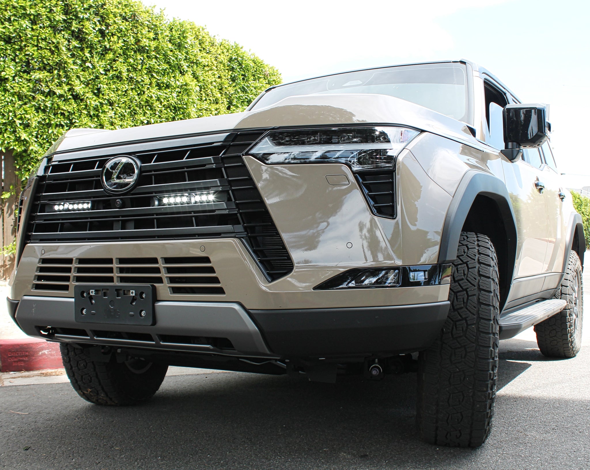 Lexus GX550 light bar on 2024+ models: two white/amber LED lights behind lower grille for GX550 Premium/Luxury/Overtrail