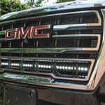 GMC Yukon 2021-24 single 40in light bar installed under the GMC logo on a black grill.