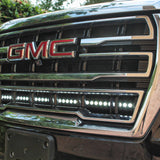 GMC Yukon 2021-24 single 40in light bar installed under the GMC logo on a black grill.