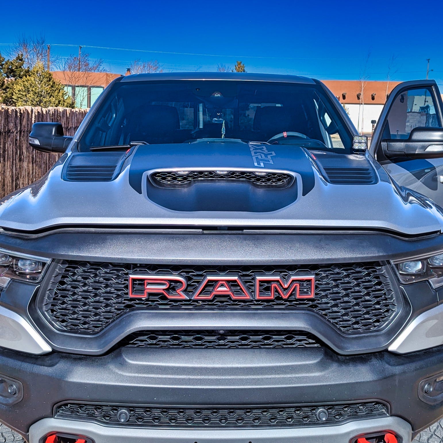 RAM 1500/TRX ditch lights on a 2019-2024 RAM truck, dual-color white LED with amber DRL backglow