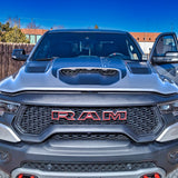 RAM 1500/TRX ditch lights on a 2019-2024 RAM truck, dual-color white LED with amber DRL backglow
