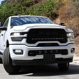 2025+ RAM 2500 & 3500 Ditch Lights PRO dual color white LED with amber DRL installed on white RAM truck front view