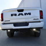 RAM 2500 Reverse Light Kit installed on white RAM 2500 truck showing bright LED reverse pods illuminated