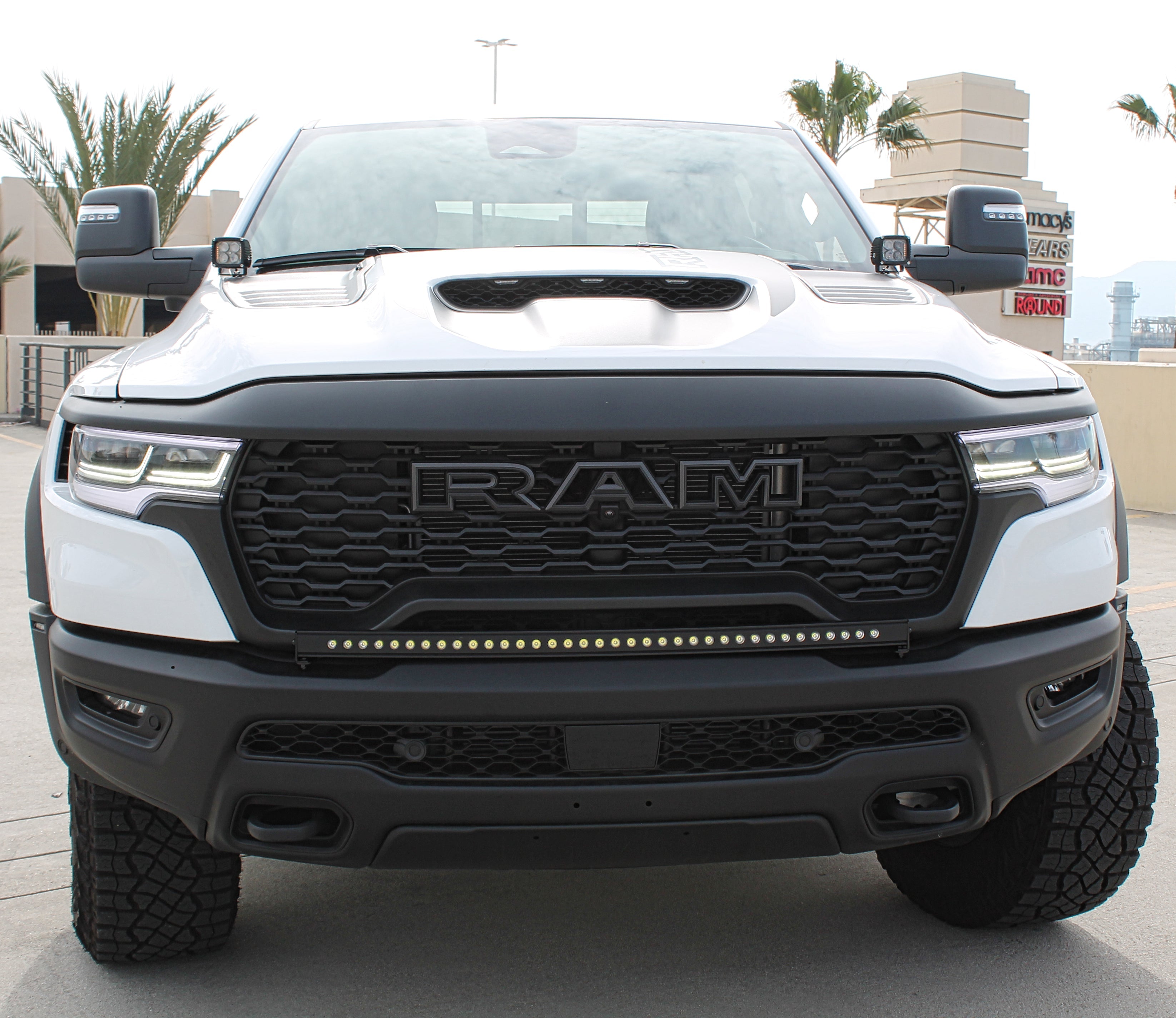 RAM RHO Lightbar on 40in Slim for RAM RHO Lightbar installation on 2025+ RAM 1500 RHO — curved, slim to bumper with black powder-coated bracket