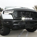 RAM RHO light bar installed on 2025 RAM 1500 RHO front grille, curved 23in PRO LED light bar between grille and bumper