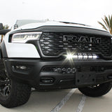 RAM RHO light bar installed on 2025 RAM 1500 RHO front grille, curved 23in PRO LED light bar between grille and bumper