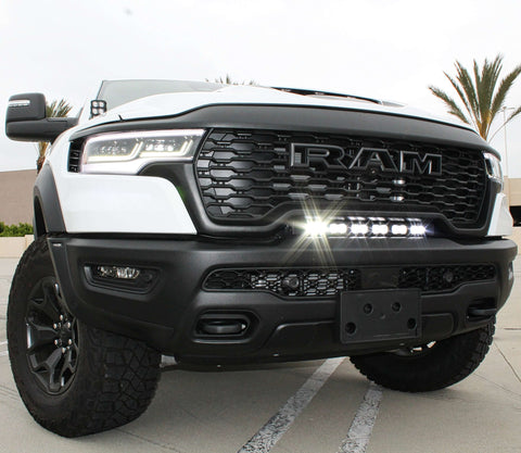 RAM RHO light bar installed on 2025 RAM 1500 RHO front grille, curved 23in PRO LED light bar between grille and bumper