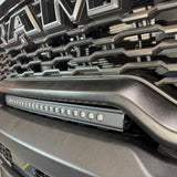 RAM RHO lightbar on 2025+ RAM 1500 Rebel with curved slim design, mounts between grille and bumper, powder-coated black bracket, 23in, RAM RHO lightbar