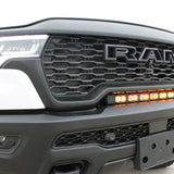 RAM RHO light bar PRO curved LED installed between grille and bumper on 2025 RAM 1500 RHO front bumper