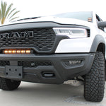 RAM RHO light bar PRO 23in curved LED installed between grille and bumper on 2025 RAM 1500 RHO truck front view