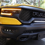 RAM TRX Light bar slim 23in curved LED light bar in factory grille opening on yellow 2021-2024 RAM 1500 TRX front view