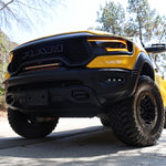 RAM TRX Light bar slim 23in mounted in grille opening on yellow 2021-2024 RAM 1500 TRX front view