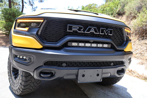RAM TRX Lightbar 23in PRO installed in grille opening on 2021-2024 RAM 1500 TRX front bumper