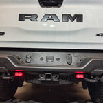 RAM RHO REVERSE Reverse Light Kit on 2025-2026 RAM 1500 RHO — pair of white LED pods with amber/red backlight options for turn signal or brake