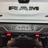RAM RHO REVERSE Reverse Light Kit on 2025-2026 RAM 1500 RHO — pair of white LED pods with amber/red backlight options for turn signal or brake