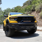 RAM TRX Lightbar 23in PRO on yellow RAM 1500 TRX in factory grille opening, off-road LED curved light bar front view