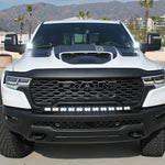 RAM RHO Ditch Lights - PRO 2025+ on RAM 1500 with dual white LED and amber DRL backglow under hood, rugged front view