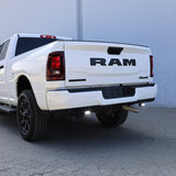 RAM 2500 Reverse Light Kit installed on white RAM 2500 truck showing bright rear LED reverse pods illuminated
