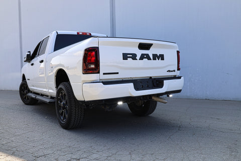 RAM 2500 Reverse Light Kit installed on white RAM 2500 truck showing bright rear LED reverse pods illuminated
