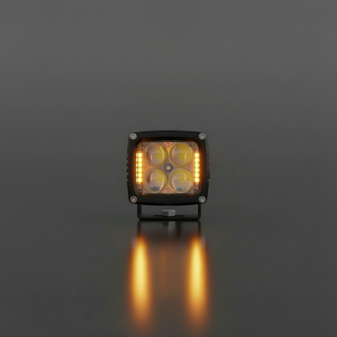 2025+ RAM 2500 3500 Ditch Lights dual color LED pod with amber DRL backglow on dark reflective surface