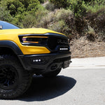 RAM TRX Lightbar 23in PRO installed on yellow 2021-2024 RAM 1500 TRX front grille and bumper opening
