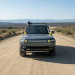 gray 2024 rivian with ditch lights for off roading 