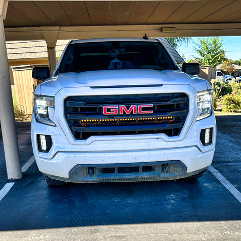 2019 2020 2021 2022 2023 whitevGMC Sierra 1500 with one 40in Light Bar behind the grille