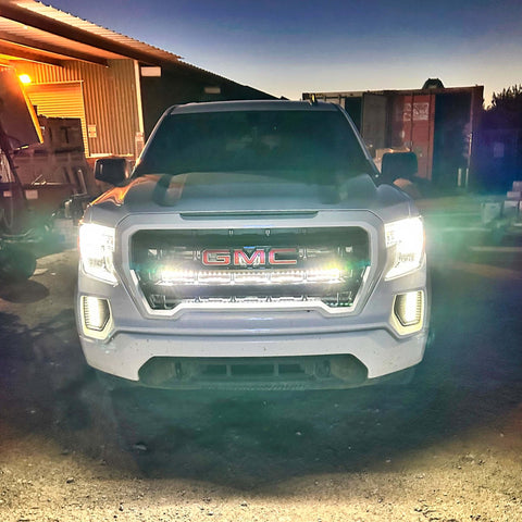 2019 2020 2021 2022 2023 gray GMC Sierra 1500 with two white 40in behind grille light bar