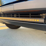 black tesla cybertruck curved amber  LED light bar close to the bumper m&r automotive