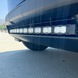 close up black tesla cybertruck with white curved LED light bar m&r automotive 
