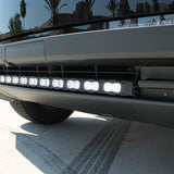 close up view black tesla cybertruck with curved white LED light bar m&r automotive 