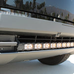 side view black tesla cybertruck with curved LED light bar amber backglow 