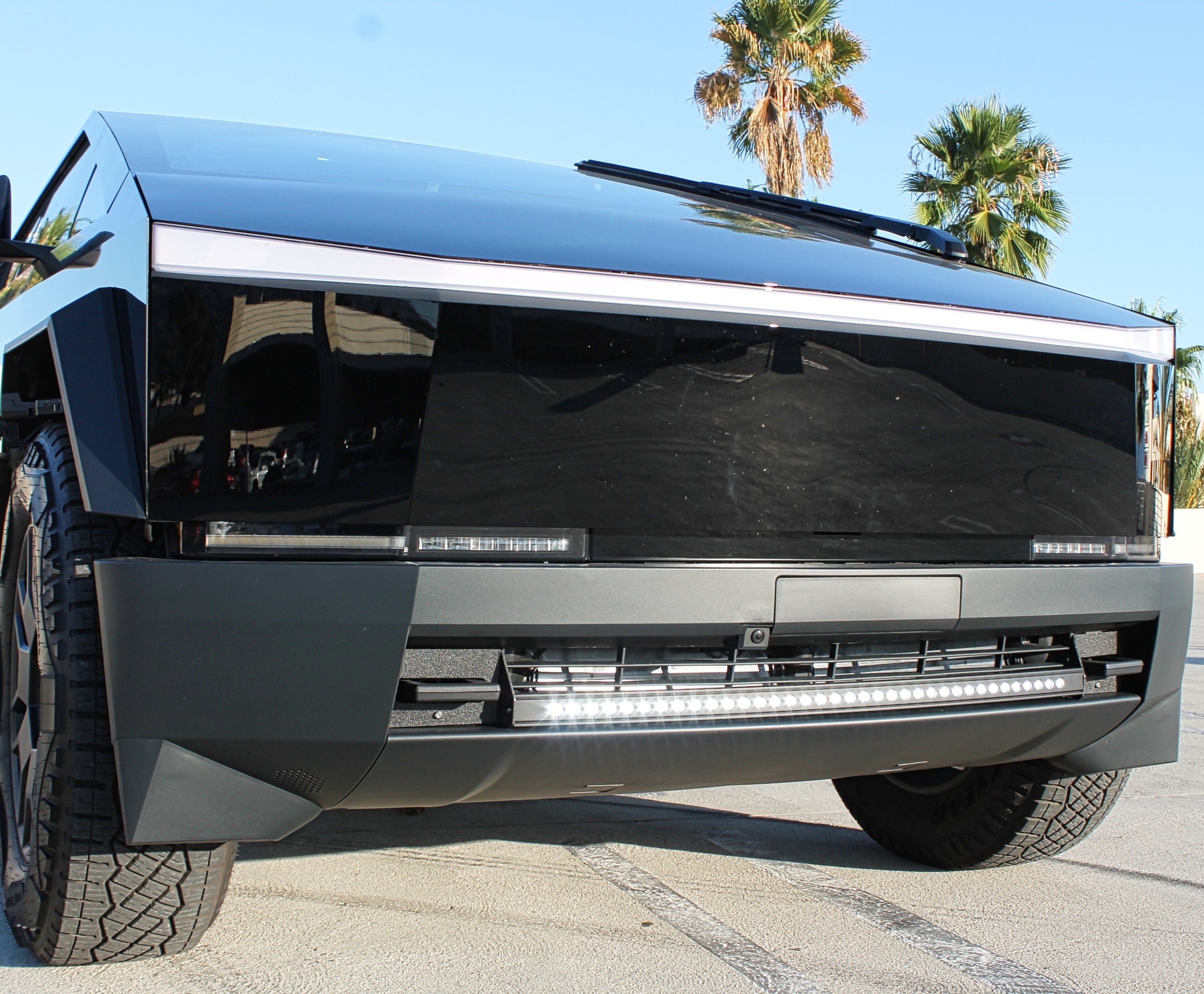Black Tesla Cybertruck with the 40in SLIM curved LED light bar mounted in the bumper, top view