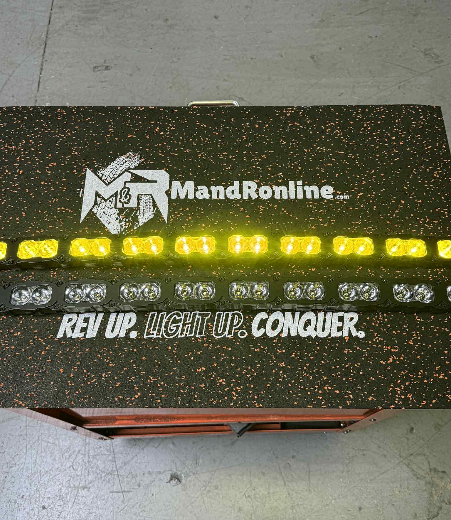 Chevrolet Silverado Light Bars on a M&R MandOnline box, dual 40s LED light bars mounted on a rail system for Silverado HD pickups