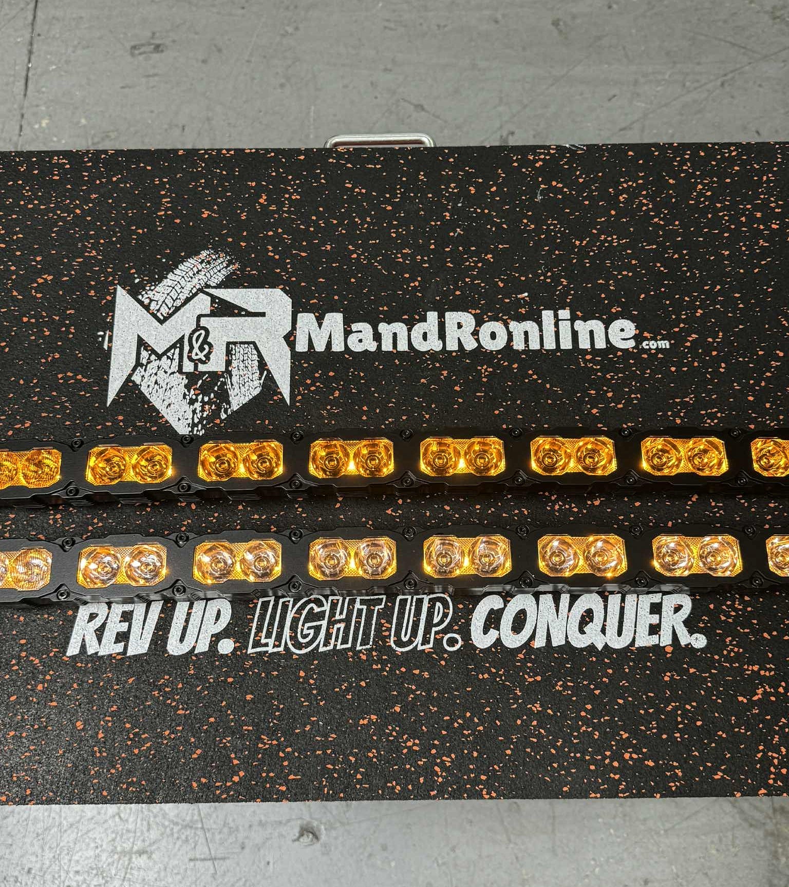 Chevrolet Silverado Light Bars — MandROnline product branding on textured black panel with amber LEDs