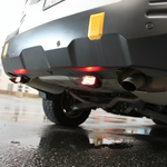 Subaru Outback reverse light kit 2020-2024 installed on rear bumper with bright LED pods illuminated