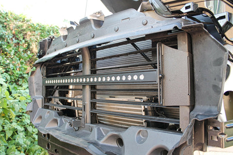 2023 2024 white chevrolet colorado with one behind grille 30in light bar grille off