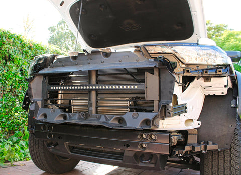 2023 2024 white chevrolet colorado with behind grille 30in light bar grille off