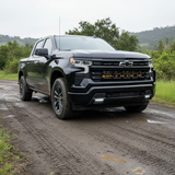 chevrolet Silverado 1500 Light Bars PRO installed on 2022+ Silverado 1500 front grille driving on muddy trail