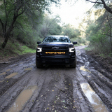 chevrolet silverado 1500 Light Bars PRO installed on 2022+ Silverado 1500 driving on muddy forest trail