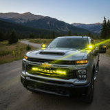 Silverado 2500 3500 light bar single 40in PRO mounted on 2020-2026 Silverado 2500HD driving off-road with bright yellow LED lights