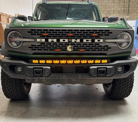 green 20213bronco capable bumper with led light bar installed on top for off roading amber day time running lights