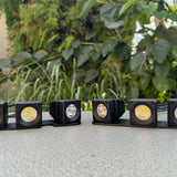 ford bronco six light pods on top of black metal bracket for boomerang kit