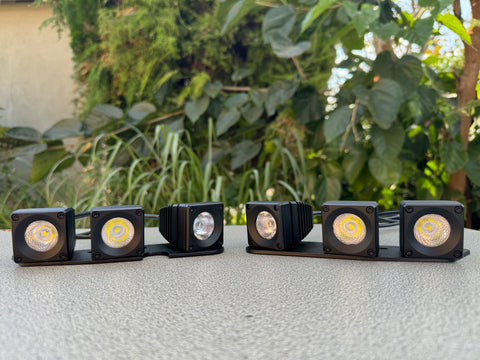 ford bronco six light pods on top of black metal bracket for boomerang kit