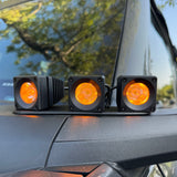 front view of amber ditch lights 3 pods on driver side ford bronco