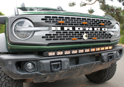 green 2024 bronco capable bumper with amber led light bar installed on top for off roading